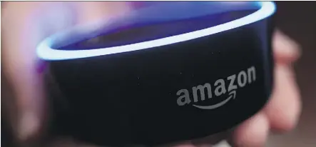  ?? MIKE STEWART/THE ASSOCIATED PRESS ?? Amazon is hoping for the day when its devices powered by its Alexa digital assistant will overtake smartphone­s and dominate consumers’ lives. It is offering numerous gadgets, including a revamped version of its popular Echo Dot speaker, above, which has 70-per-cent improved sound.