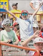  ?? Lori Van Buren / Times Union ?? Kids from Lynnwood Elementary cheer as they watch the Valleycats play Trois-rivières during a Kids Day baseball game Wednesday in Troy.