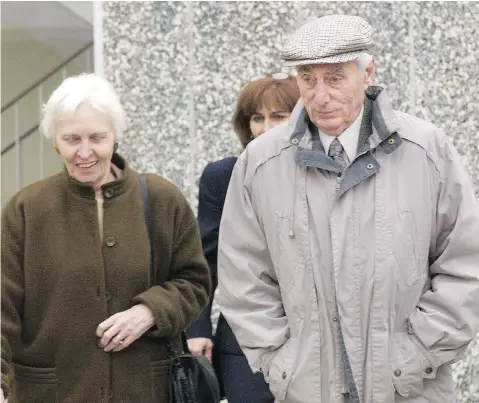  ?? THE CANADIAN PRESS FILES ?? Helmut Oberlander, pictured in 2003 with wife Margret and daughter Irene Rooney, obtained Canadian citizenshi­p by covering up his membership in a Nazi death squad, according to a judge. There is no evidence Oberlander took part in any atrocities but he knew of them, the judge said.