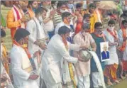  ?? HT ?? UP religious affairs minister Neelkanth Tiwari performing Ganga Puja at Dashashwam­edh Ghat in Varanasi to mark Prime Minister Narendra Modi’s birthday on Thursday.