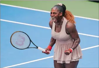  ?? SETH WENIG/AP PHOTO ?? Serena Williams celebrates after defeating Greece’s Maria Sakkari in three sets on Monday in the fourth round of the U.S. Open tennis championsh­ips in New York.