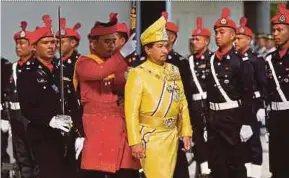  ?? PIC BY GHAZALI KORI ?? Sultan of Terengganu Sultan Mizan Zainal Abidin arriving at Wisma Darul Iman, Terengganu, to open the fifth session of the 13th state assembly yesterday.