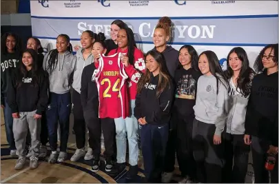  ?? HALEY SAWYER — STAFF ?? Mackenly Randolph is joined by her Sierra Canyon teammates after being presented with her McDonald's All-American Game jersey.