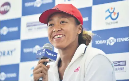  ?? Picture: AFP ?? RELAXED. US Open champion Naomi Osaka of Japan answers questions during a press conference ahead of the Pan Pacific Open yesterday.