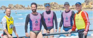  ??  ?? WINNERS ARE GRINNERS: (Main) Gold medal-winners Lorne Edge in the open women's surfboards and, above, the Lorne Growlers. Pictures: ANDY BERRY