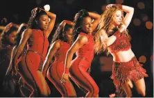  ?? Scott Strazzante / The Chronicle ?? Shakira (right) dazzled with a performanc­e that included a belly dance and her signature song, “Hips Don’t Lie.”