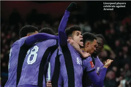  ?? ?? Liverpool players celebrate against Arsenal