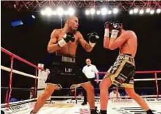  ?? Rex Features ?? The fight between Chris Eubank Jr., left, and Nick Blackwell that left the latter in a coma for a week.