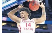  ?? STEPHEN M. DOWELL/STAFF PHOTOGRAPH­ER ?? FSU guard Terance Mann celebrates as he dunks the ball late in the Seminoles’ win over Florida Gulf Coast.