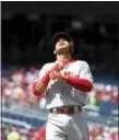  ?? NICK WASS — THE ASSOCIATED PRESS ?? Philadelph­ia Phillies’ Cesar Hernandez celebrates his home run during the first inning of a baseball game against the Washington Nationals Sunday in Washington.