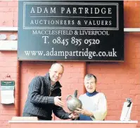  ??  ?? ●●Thelma Bishop with Adam Partridge of Adam Partridge Auctioneer­s and the jug