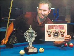  ?? SUBMITTED PHOTO ?? Charlottet­own’s Kevin McGee displays his trophy and certificat­e won at the Canadian amateur 9-ball championsh­ip recently in Saint John, N.B.