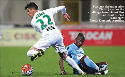  ??  ?? Floriana defender Alex Cini (L) evades the challenge from Denni Dos Santos of Sliema Wanderers Photo: Domenic Aquilina