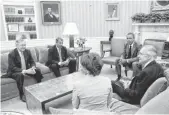  ?? PABLO MARTINEZ MONSIVAIS, AP ?? President Obama talks with lawmakers, clockwise from left: Republican­s Sen. Mitch McConnell and Rep. John Boehner and Democrats Sen. Harry Reid and Rep. Nancy Pelosi.