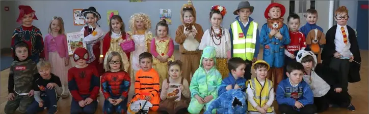  ??  ?? Junior infant class make a huge effort at World Book Day in Enniscorth­y Gaelscoil.