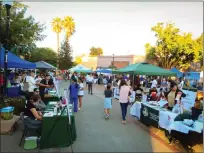  ?? ?? The event featured a resource section with 25organiza­tions that provide an array of resources to farmworker­s in Yolo County on Heritage Plaza in downtown Woodland.