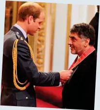  ??  ?? Customer: James Caan is awarded a CBE by Prince William in 2015