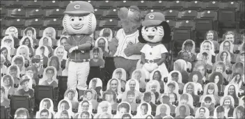  ?? ASSOCIATED PRESS ?? CINCINNATI REDS
MASCOTS Mr. Red, left, Gapper, middle, and Rosie Red perform among fan cutouts during a baseball game. “Those of us watching on TV are living vicariousl­y through the people in the seats. Remove them and the whole thing – from the cardboard cutouts to the pumped-in crowd noise – seems fraudulent,” says guest columnist Rich Manieri regarding his lack of interest in sports recently.
