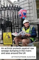  ?? AP PHOTO/FRANK AUGSTEIN ?? An activist protests against raw sewage dumping in the rivers and seas around the UK