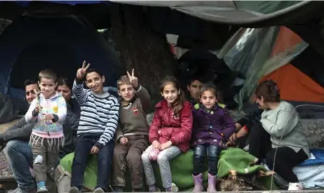  ?? SAKIS MITROLIDIS/AFP/GETTY IMAGES ?? The Balkan blockade has left thousands stranded at the Greek-Macedonian border. The EU is looking to Turkey to help contain the influx of migrants.