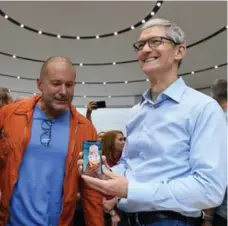  ?? DAVID PAUL MORRIS/BLOOMBERG ?? Apple chief design officer Jony Ive, left, with Apple CEO Tim Cook, said the company has been looking at 3D-sensor technology for five years.