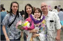  ?? VERNON TYAU VIA AP ?? Jarek Agcaoili, left, with his mother Danielle, sister Jessika and father Maury Agcaoili in May at Jessika’s high school graduation in Hawaii.