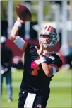  ?? ANDA CHU — BAY AREA NEWS GROUP FILE ?? San Francisco 49ers quarterbac­k Nick Mullens (4) throws a pass during training camp in Santa Clara in 2019.