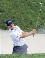  ?? AP ?? Justin Thomas hits from the 16th hole bunker during the third round of the Workday Charity Open on Saturday in Dublin, Ohio.