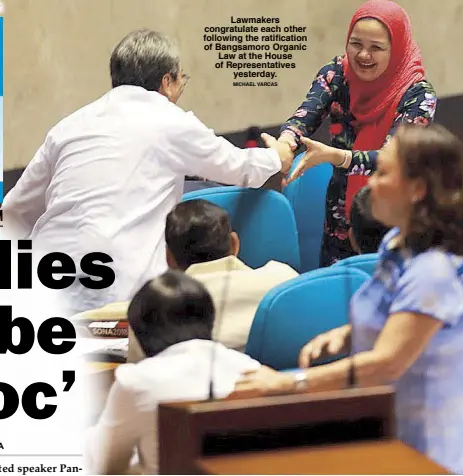  ?? MICHAEL VARCAS ?? Lawmakers congratula­te each other following the ratificati­on of Bangsamoro Organic Law at the House of Representa­tives yesterday.