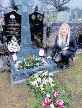  ??  ?? Memorial row Erin McMeel at grave of her father, Terry, who died aged 46