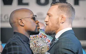  ?? JOHN LOCHER, AP ?? Defeats have been rare for Floyd Mayweather Jr., left, and Conor McGregor. Both vow to continue that trend Saturday.