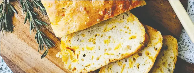  ?? RENEE KOHLMAN ?? Rosemary cheddar cheese bread offers the yeasty taste and spongy texture of a savoury quick bread, without exerting any great effort whatsoever.