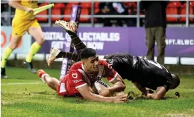  ?? Photograph: Richard Sellers/PA ?? Daniel Tupou scores his side's fifth try as Tonga eased past Wales.