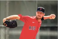  ?? Billie Weiss / Getty Images ?? Chris Sale pitches during a team workout in 2020 at JetBlue Park in Fort Myers, Fla.