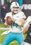  ?? STEVE MARCUS/ASSOCIATED PRESS ?? Dolphins quarterbac­k Ryan Fitzpatric­k looks to throw against the Raiders during the second half of Saturday’s game in Las Vegas, Nev.