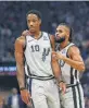  ?? Rich Pedroncell­i / AP ?? Spurs guard Patty Mills, right, confers with DeMar DeRozan during Monday night’s game at Sacramento. Mills and DeRozan are among several Spurs with California connection­s.