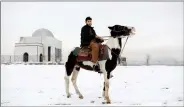  ?? REUTERS ?? Doctor Mohammad Jawed Momand, 22, poses for a picture in Kabul, Afghanista­n, on 30 January.