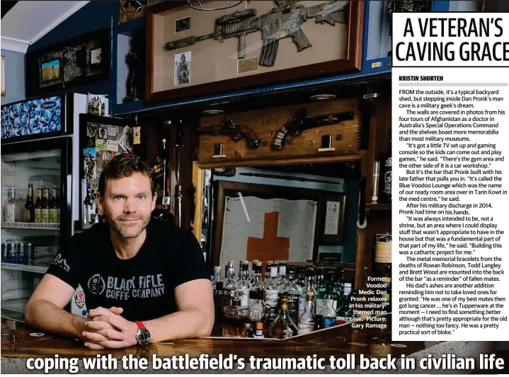 ??  ?? Former Voodoo Medic Dan Pronk relaxes in his militaryth­emed man cave Picture: Gary Ramage