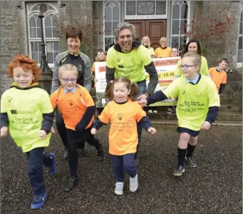  ??  ?? Mary Murphy with AlexMountc­harles Lead the Charge in the Slane St Patricks School 5K Launch