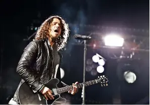  ?? ?? above Soundgarde­n’s late singing guitarist Chris Cornell