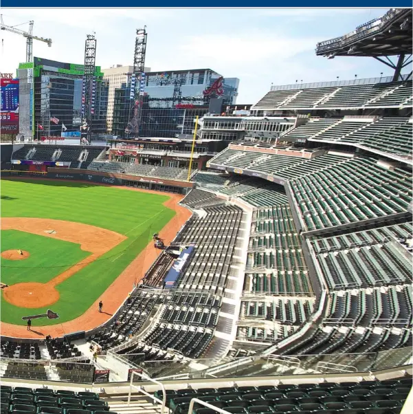  ?? DAVID GOLDMAN / THE ASSOCIATED PRESS ?? The view from the press box of SunTrust Park, the Atlanta Braves’ new stadium in Cobb County. After 20 years at Turner Field, the team takes residence in a throwback setting with green seats, brick walls and an old-school, intimate feel.