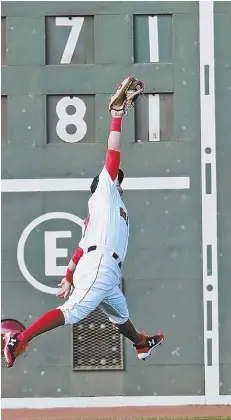  ?? StafffILEp­hotobyMatt­stoNE ?? INITIAL RESPONSE: Initials in Morse code, above right, of former Red Sox owner Tom Yawkey and his wife, Jean, have been on a Fenway Park Green Monster scoreboard for 70 years.