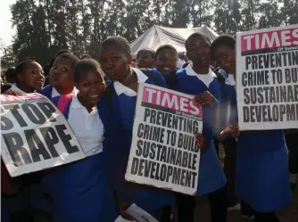  ??  ?? Some of the students from the local High Schools who took part in the Gender based violence March organised by Fr. McCormack in Malkearns, Swaziland.