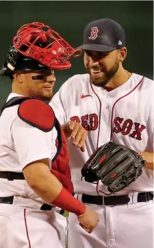  ?? STuART CAHILL PHoTos / HeRALd sTAFF FILe ?? TAKING COMMAND: Red Sox reliever Matt Barnes congratula­tes catcher Christian Vazquez after a win over the Orioles at Fenway Park on Sept. 22, 2020. Below, Former Sox center fielder Jackie Bradley Jr. makes a diving catch on July 25, 2020.