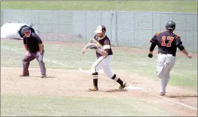  ?? MARK HUMPHREY ENTERPRISE-LEADER ?? Prairie Grove senior Cole Speed records an out at first base. The Tigers’ baseball season came to an end with a 5-4 loss to Gravette in the first-round of the District 4A-1 Baseball tournament Thursday.