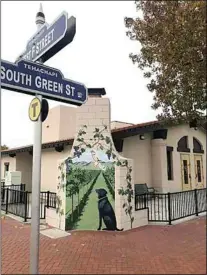  ?? COURTESY OF LYN BENNETT ?? Local residents can now enjoy another one of Lyn Bennett’s murals on the corner of F and Green streets.