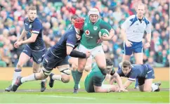  ??  ?? Ball carrier: Rory Best leads Ireland from the front against Scotland