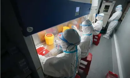  ?? Photograph: Xinhua/REX/Shuttersto­ck ?? Common triggers for abuse against scientists were them offering views on Covid vaccinatio­n, face masks and drug efficacy.