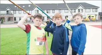  ??  ?? Dylan Scannell (Gneeveruil­la),Brendan O’Leary and Ethen Tritschker (Listowel) in the in the Kerry Athletic County Finals of the Javelin throwing at An Riocht AC Castleisla­nd on Saturday