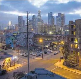  ?? Jabin Botsford Los Angeles Times ?? THE ARTS DISTRICT in downtown L.A, shown in 2014, is seeing a developmen­t boom. Some California­ns worry about higher density and a water shortage.